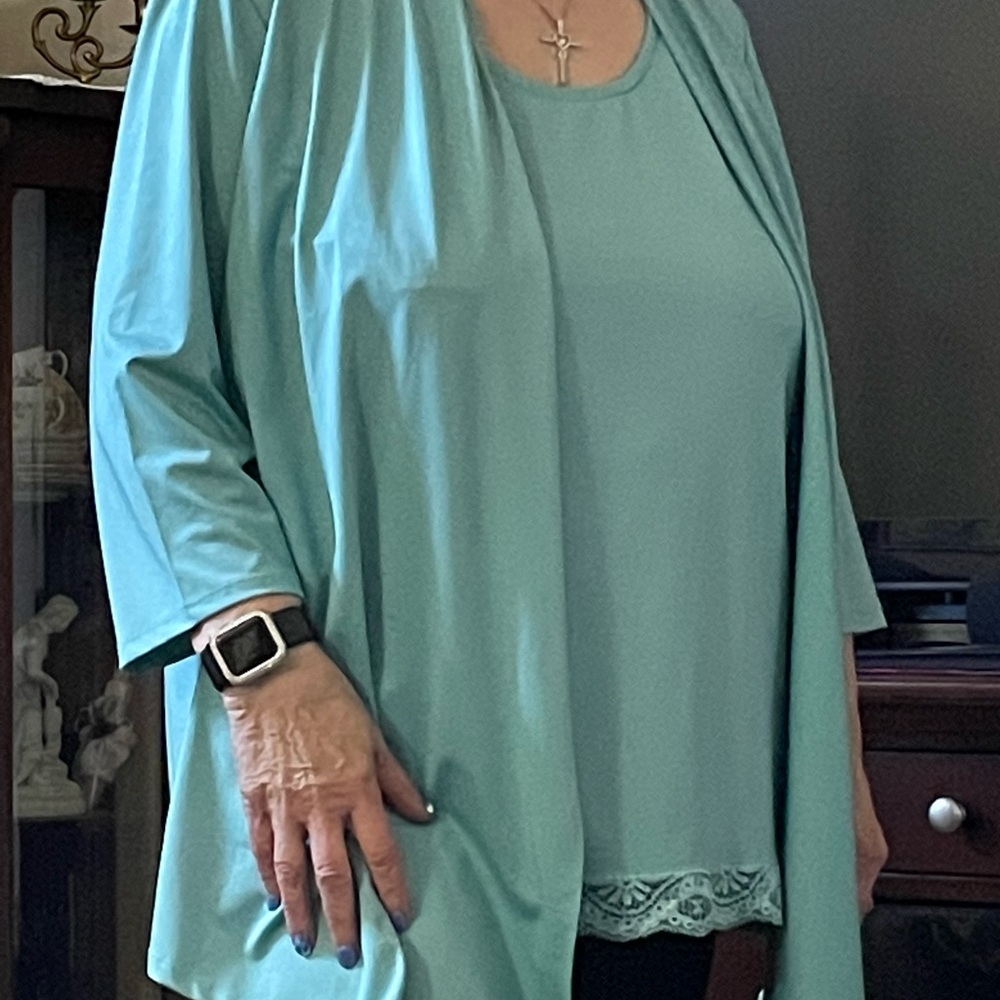 Women’s tunic top with attached jacket  3/4 sleeve.